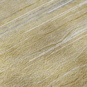 Photo of Gold Gray And Ivory Striped Washable Area Rug With UV Protection