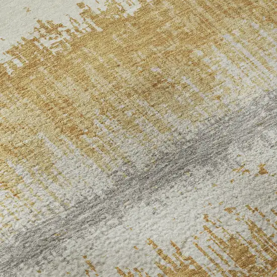 Gold Gray And Ivory Striped Washable Area Rug With UV Protection Photo 1