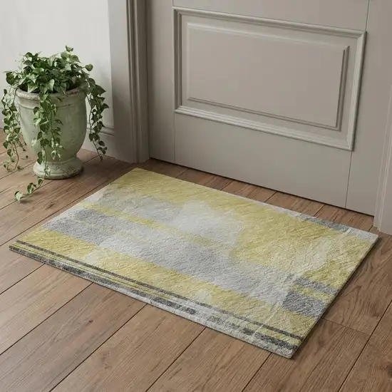 Gold Gray And Ivory Striped Washable Area Rug With UV Protection Photo 1