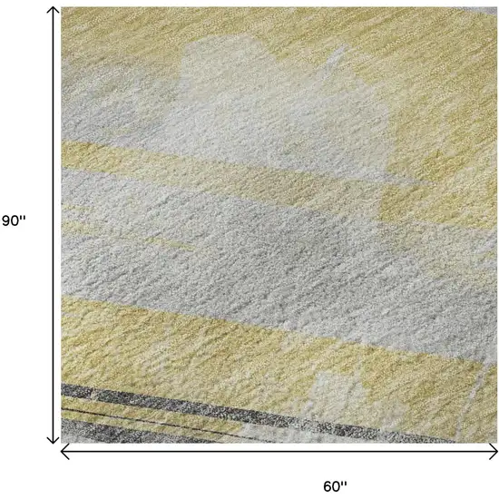 Gold Gray And Ivory Striped Washable Area Rug With UV Protection Photo 9