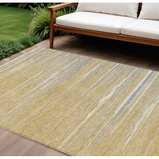 Gold Gray And Ivory Striped Washable Indoor Outdoor Area Rug Photo 1