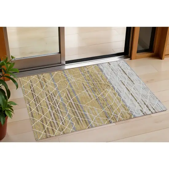Gold Gray And Ivory Striped Washable Indoor Outdoor Area Rug Photo 1