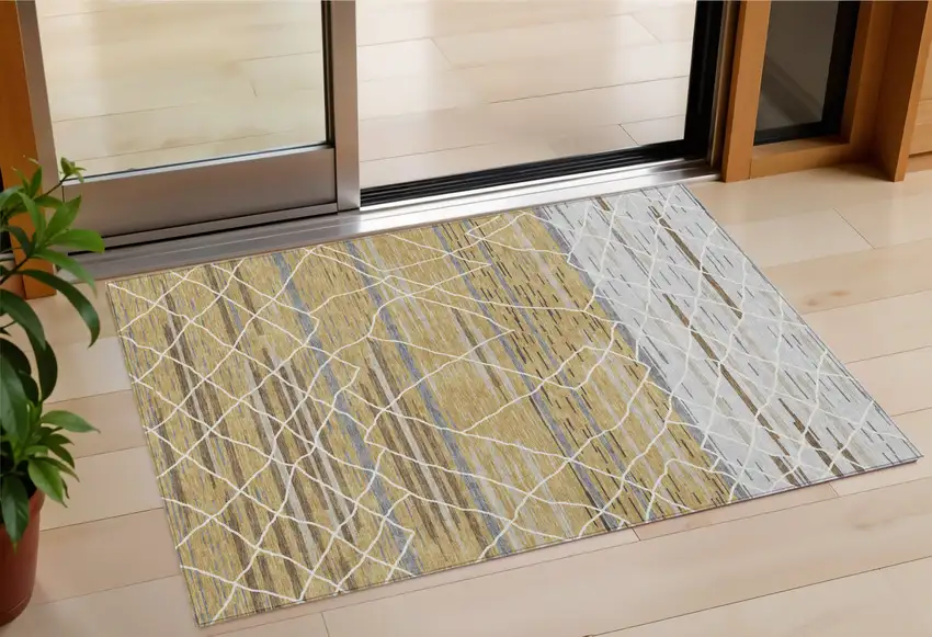Gold Gray And Ivory Striped Washable Indoor Outdoor Area Rug Photo 1