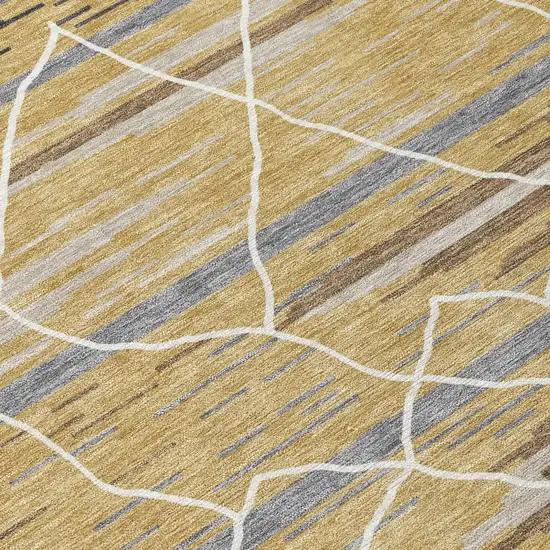 Gold Gray And Ivory Striped Washable Indoor Outdoor Area Rug Photo 6