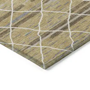 Photo of Gold Gray And Ivory Striped Washable Indoor Outdoor Area Rug