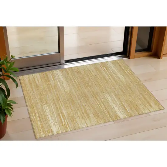 Gold Gray And Ivory Striped Washable Indoor Outdoor Area Rug Photo 1