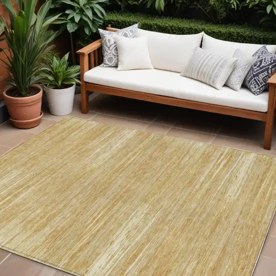 Gold Gray And Ivory Striped Washable Indoor Outdoor Area Rug Photo 1