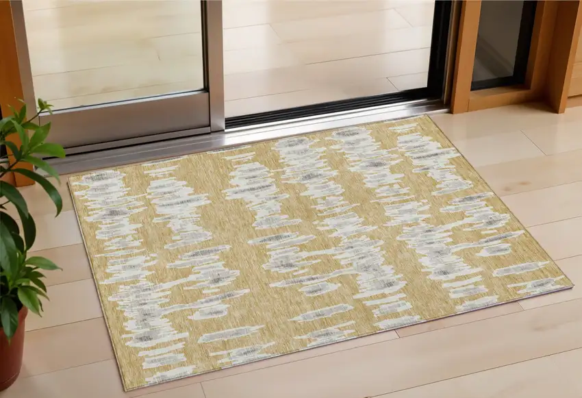 Gold Gray And Ivory Striped Washable Indoor Outdoor Area Rug Photo 1
