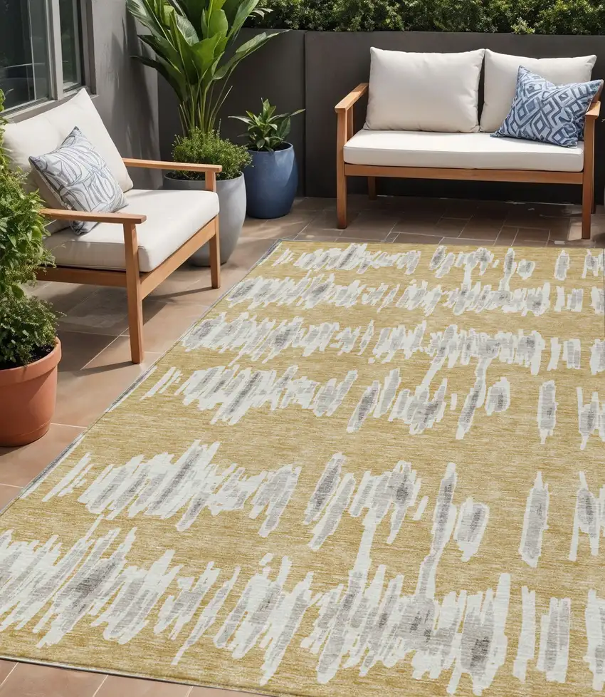 Gold Gray And Ivory Striped Washable Indoor Outdoor Area Rug Photo 1