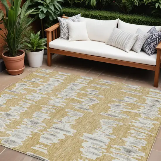 Gold Gray And Ivory Striped Washable Indoor Outdoor Area Rug Photo 1