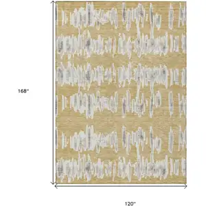 Photo of Gold Gray And Ivory Striped Washable Indoor Outdoor Area Rug