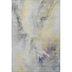 Photo of Gold Gray And Silver Abstract Washable Area Rug With UV Protection
