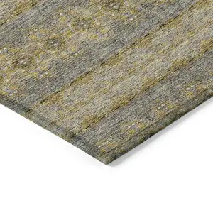 Photo of Gold Gray And Silver Floral Medallion Washable Indoor Outdoor Area Rug