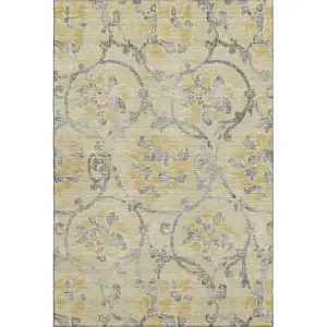 Photo of Gold Gray And Silver Floral Washable Area Rug With UV Protection