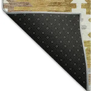 Photo of Gold Gray And Silver Southwestern Washable Area Rug With UV Protection