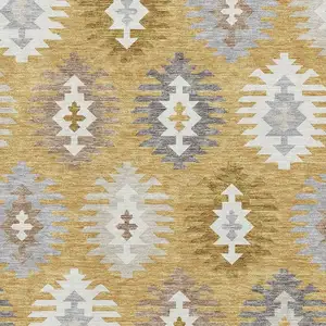 Photo of Gold Gray And Silver Southwestern Washable Area Rug With UV Protection