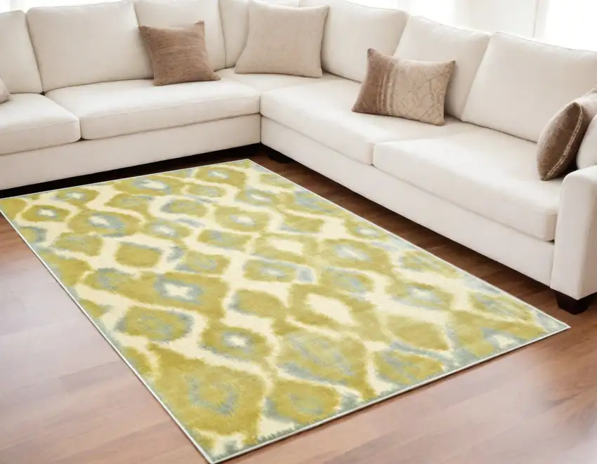 Gold Gray and Tan Abstract Power Loom Area Rug Photo 1