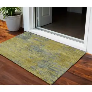 Photo of Gold Green And Gray Abstract Washable Indoor Outdoor Area Rug