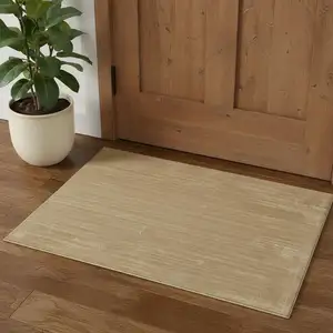 Photo of Gold Hand Woven Area Rug