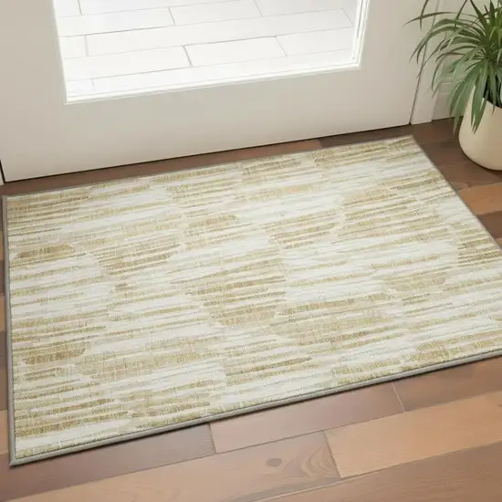 Gold Ivory And Beige Abstract Washable Area Rug With UV Protection Photo 2