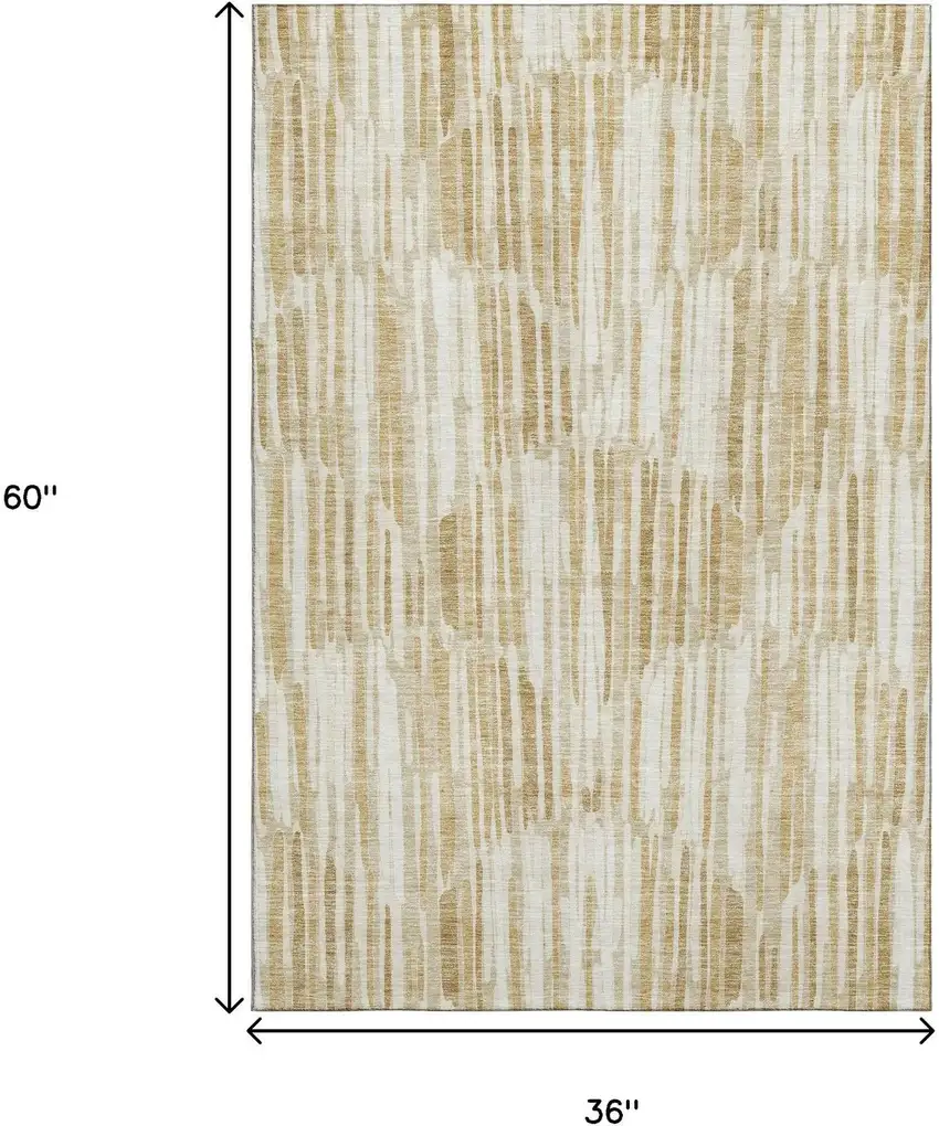 Gold Ivory And Beige Abstract Washable Area Rug With UV Protection Photo 3