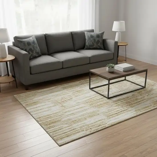 Gold Ivory And Beige Abstract Washable Area Rug With UV Protection Photo 2