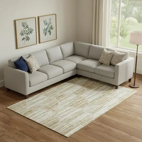 Gold Ivory And Beige Abstract Washable Area Rug With UV Protection Photo 1