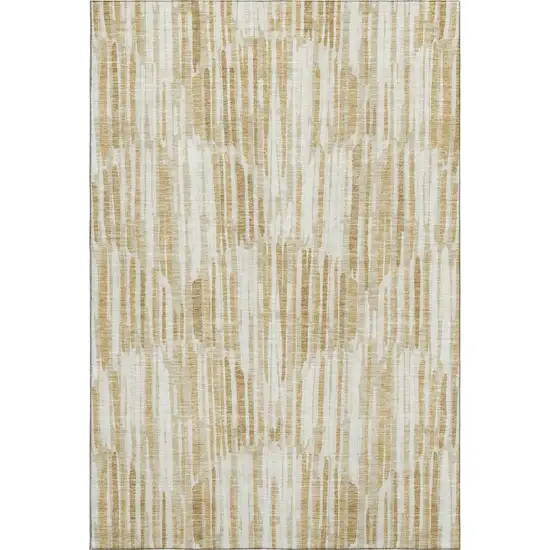 Gold Ivory And Beige Abstract Washable Area Rug With UV Protection Photo 1