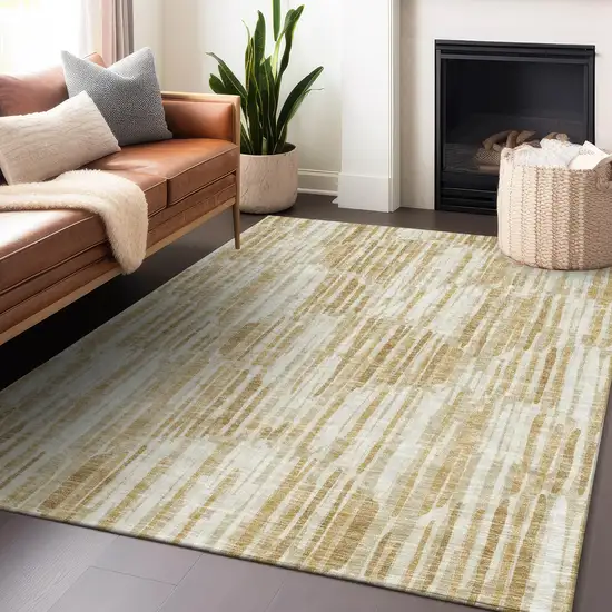 Gold Ivory And Beige Abstract Washable Area Rug With UV Protection Photo 5