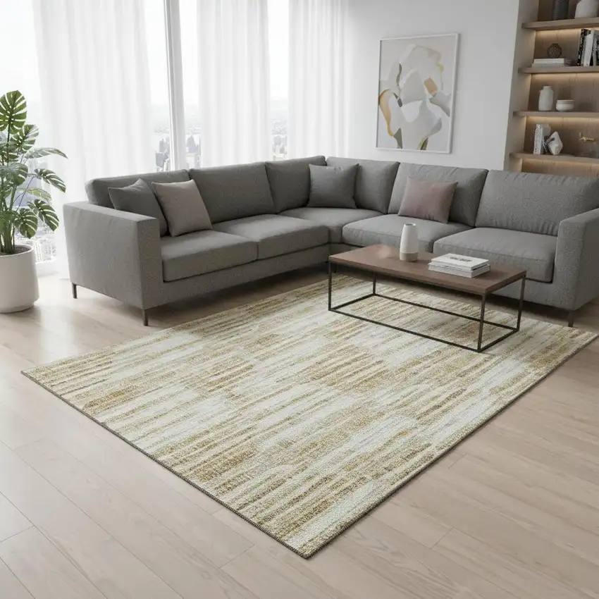 Gold Ivory And Beige Abstract Washable Area Rug With UV Protection Photo 2