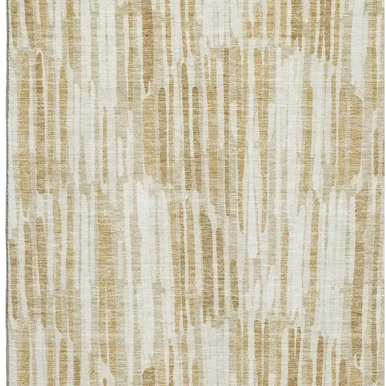 Gold Ivory And Beige Abstract Washable Area Rug With UV Protection Photo 3