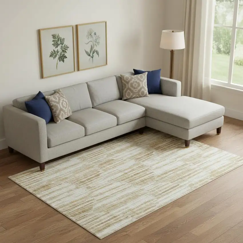 Gold Ivory And Beige Abstract Washable Area Rug With UV Protection Photo 1