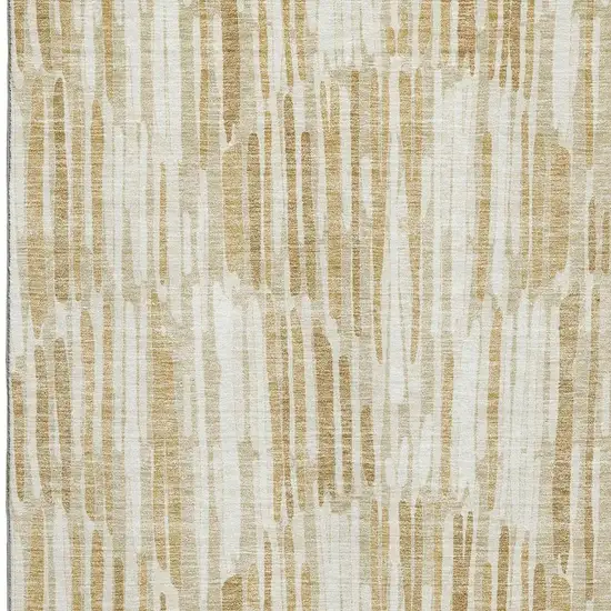 Gold Ivory And Beige Abstract Washable Area Rug With UV Protection Photo 3