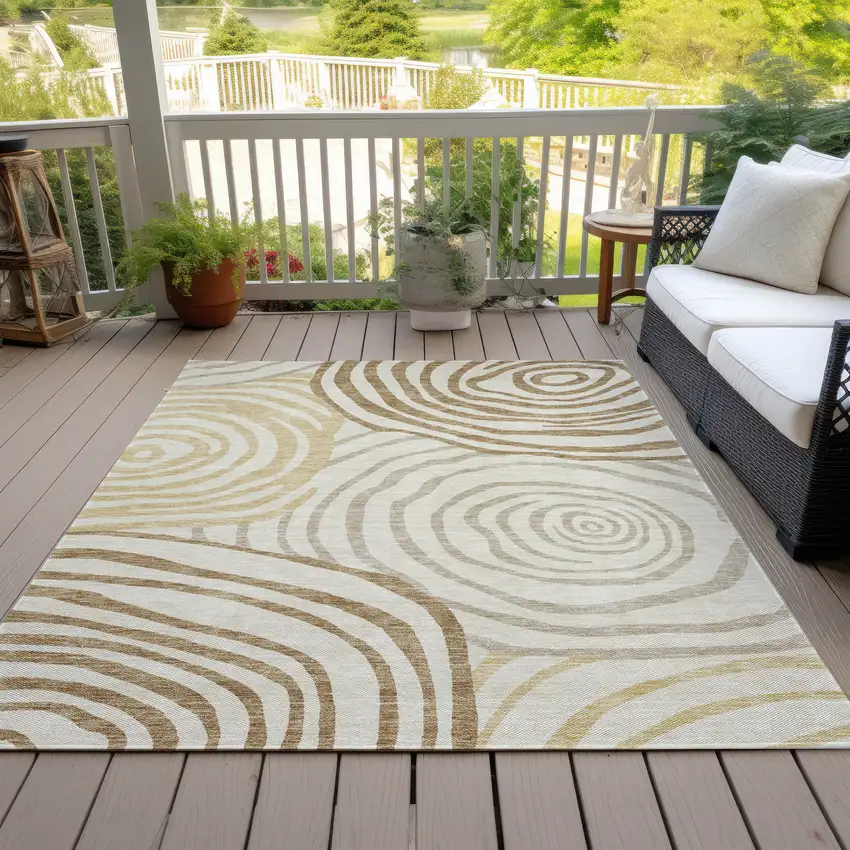 Gold Ivory And Beige Abstract Washable Indoor Outdoor Area Rug Photo 7