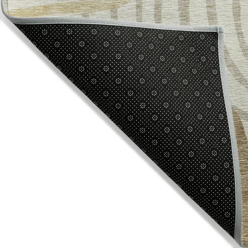 Gold Ivory And Beige Abstract Washable Indoor Outdoor Area Rug Photo 3