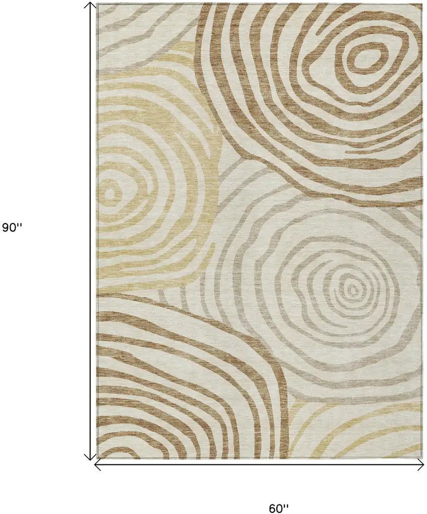 Gold Ivory And Beige Abstract Washable Indoor Outdoor Area Rug Photo 3