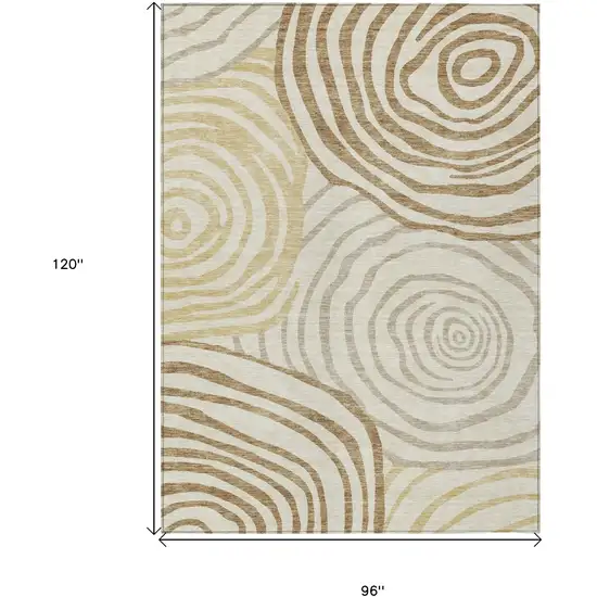 Gold Ivory And Beige Abstract Washable Indoor Outdoor Area Rug Photo 3
