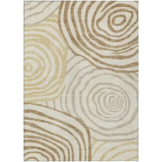 Gold Ivory And Beige Abstract Washable Indoor Outdoor Area Rug Photo 1