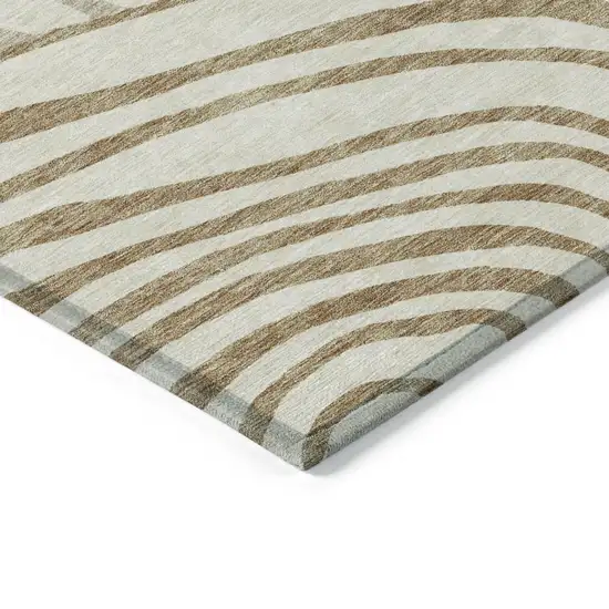 Gold Ivory And Beige Abstract Washable Indoor Outdoor Area Rug Photo 3