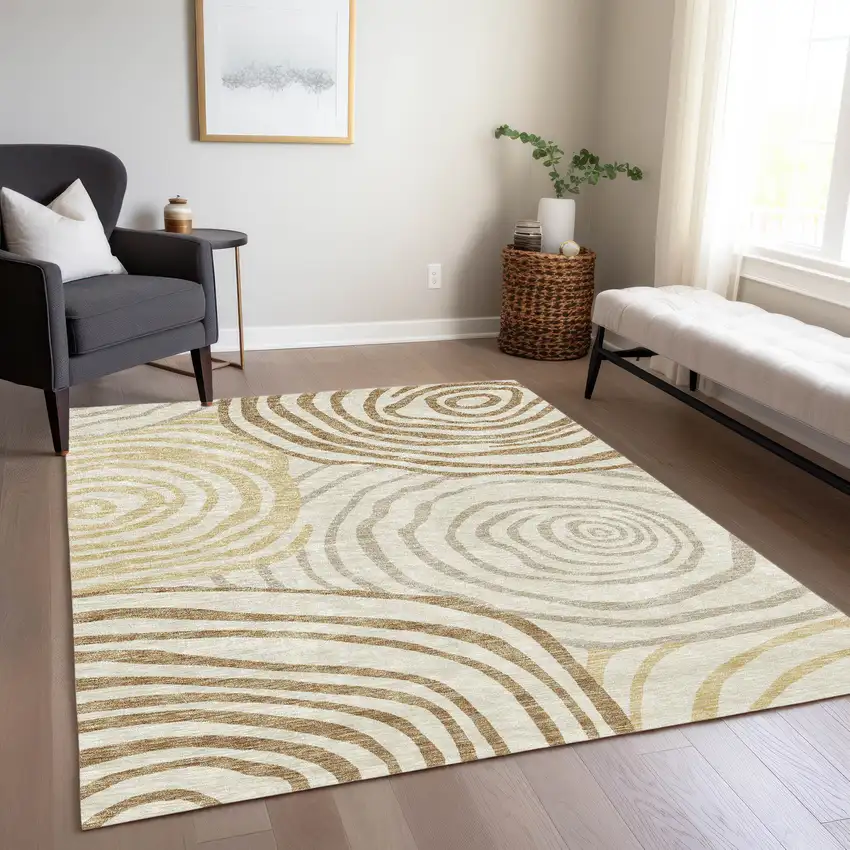 Gold Ivory And Beige Abstract Washable Indoor Outdoor Area Rug Photo 8