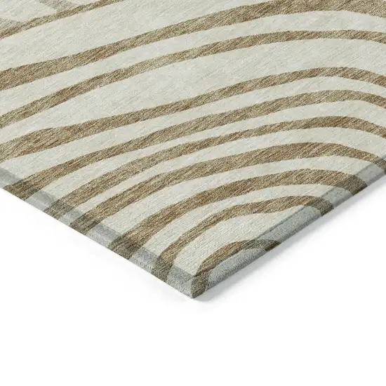 Gold Ivory And Beige Abstract Washable Indoor Outdoor Area Rug Photo 3