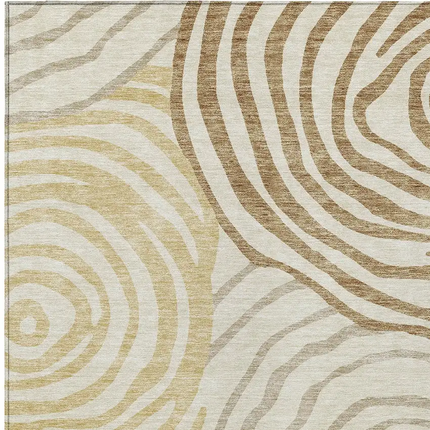 Gold Ivory And Beige Abstract Washable Indoor Outdoor Area Rug Photo 4