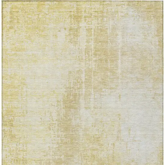 Gold Ivory And Beige Abstract Washable Indoor Outdoor Area Rug Photo 7