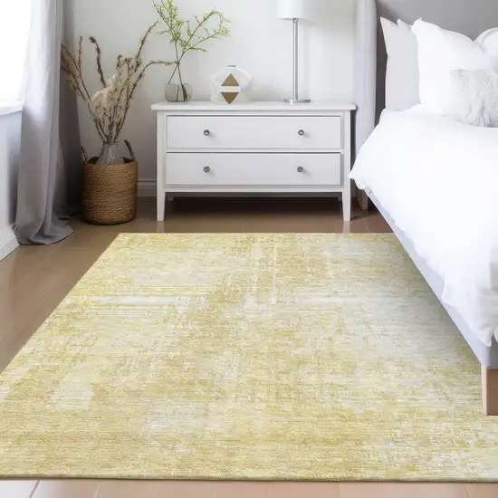 Gold Ivory And Beige Abstract Washable Indoor Outdoor Area Rug Photo 9