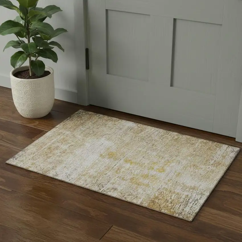 Gold Ivory And Beige Geometric Washable Area Rug With UV Protection Photo 1