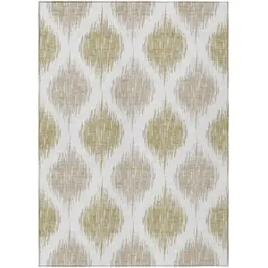 Photo of Gold Ivory And Beige Ikat Washable Indoor Outdoor Area Rug