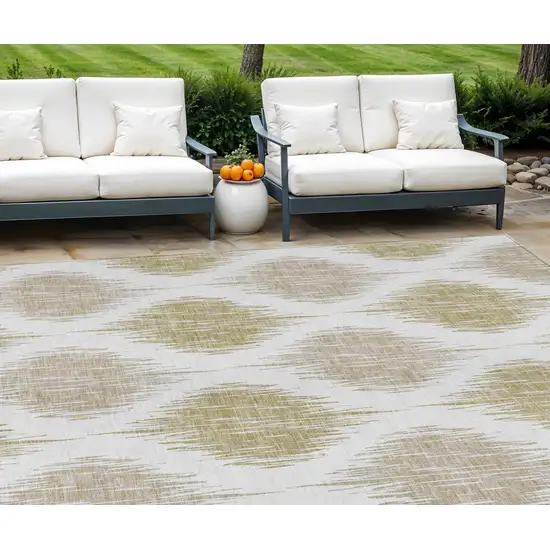 Gold Ivory And Beige Ikat Washable Indoor Outdoor Area Rug Photo 1