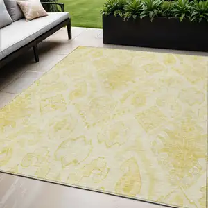 Photo of Gold Ivory And Beige Moroccan Washable Indoor Outdoor Area Rug