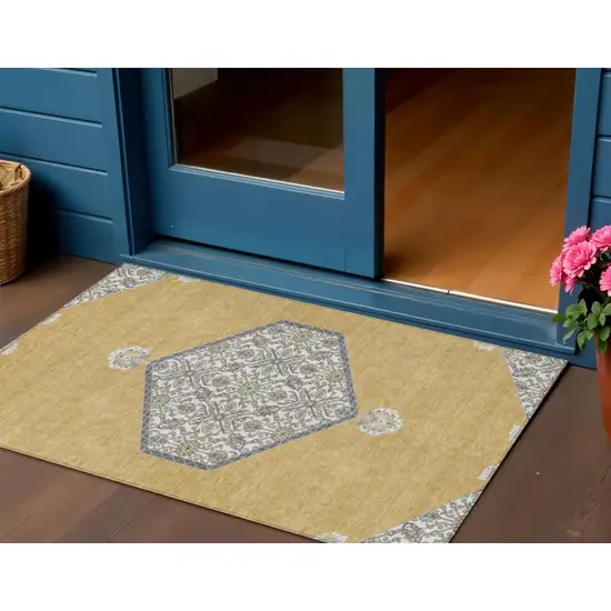Gold Ivory And Beige Oriental Washable Indoor Outdoor Area Rug Photo 1