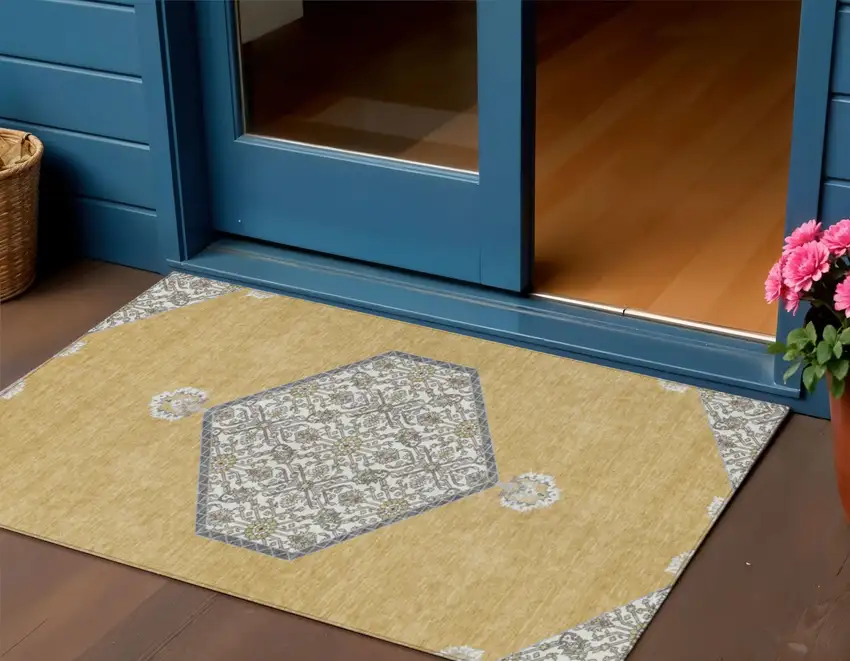Gold Ivory And Beige Oriental Washable Indoor Outdoor Area Rug Photo 1
